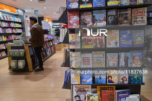 A glimpse inside an Italian bookstore in Bari, Italy, on December 2, 2024, shows a place where the passion for books and culture meets. Shel...