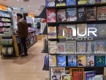 A glimpse inside an Italian bookstore in Bari, Italy, on December 2, 2024, shows a place where the passion for books and culture meets. Shel...