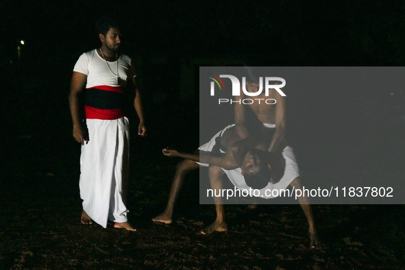 An instructor teaches Angampora fighting techniques to his students in Eheliyagoda, Sri Lanka, on December 5, 2024. Angampora is a 3,000-yea...