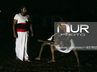 An instructor teaches Angampora fighting techniques to his students in Eheliyagoda, Sri Lanka, on December 5, 2024. Angampora is a 3,000-yea...