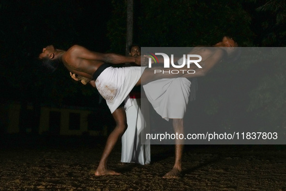 An instructor teaches Angampora fighting techniques to his students in Eheliyagoda, Sri Lanka, on December 5, 2024. Angampora is a 3,000-yea...