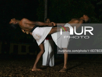 An instructor teaches Angampora fighting techniques to his students in Eheliyagoda, Sri Lanka, on December 5, 2024. Angampora is a 3,000-yea...