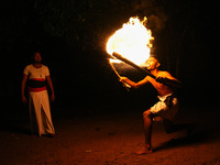 Angampora students perform their skills using fire and swords in Eheliyagoda, Sri Lanka, on December 5, 2024. Angampora is a 3,000-year-old...