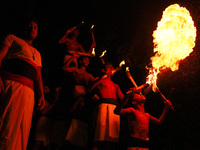 Angampora students perform their skills using fire in Eheliyagoda, Sri Lanka, on December 5, 2024. Angampora is a 3,000-year-old martial art...