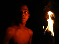 An Angampora student holds a fire torch in Eheliyagoda, Sri Lanka, on December 5, 2024. Angampora is a 3,000-year-old martial art from Sri L...