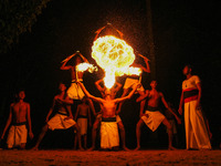 Angampora students perform their skills using fire in Eheliyagoda, Sri Lanka, on December 5, 2024. Angampora is a 3,000-year-old martial art...