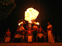 Angampora students perform their skills using fire in Eheliyagoda, Sri Lanka, on December 5, 2024. Angampora is a 3,000-year-old martial art...