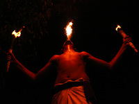 Angampora students perform their skills using fire in Eheliyagoda, Sri Lanka, on December 5, 2024. Angampora is a 3,000-year-old martial art...