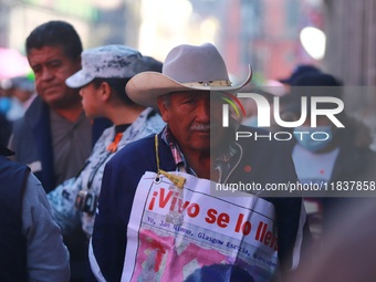 Relatives of the 43 students from the Normal Rural School of Ayotzinapa, victims of forced disappearance in 2014, attend a meeting with the...