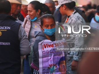 Relatives of the 43 students from the Normal Rural School of Ayotzinapa, victims of forced disappearance in 2014, attend a meeting with the...