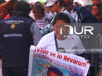 Relatives of the 43 students from the Normal Rural School of Ayotzinapa, victims of forced disappearance in 2014, attend a meeting with the...