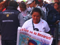 Relatives of the 43 students from the Normal Rural School of Ayotzinapa, victims of forced disappearance in 2014, attend a meeting with the...