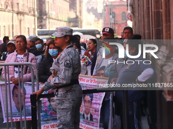 Relatives of the 43 students from the Normal Rural School of Ayotzinapa, victims of forced disappearance in 2014, attend a meeting with the...