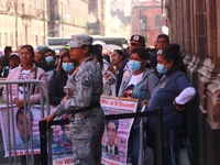 Relatives of the 43 students from the Normal Rural School of Ayotzinapa, victims of forced disappearance in 2014, attend a meeting with the...