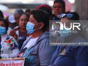 Relatives of the 43 students from the Normal Rural School of Ayotzinapa, victims of forced disappearance in 2014, attend a meeting with the...