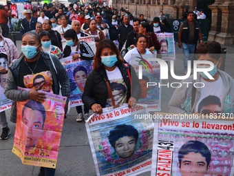 Relatives of the 43 students from the Normal Rural School of Ayotzinapa, victims of forced disappearance in 2014, attend a meeting with the...