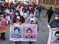 Relatives of the 43 students from the Normal Rural School of Ayotzinapa, victims of forced disappearance in 2014, attend a meeting with the...