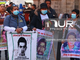 Relatives of the 43 students from the Normal Rural School of Ayotzinapa, victims of forced disappearance in 2014, attend a meeting with the...