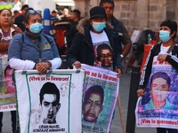 Relatives of the 43 students from the Normal Rural School of Ayotzinapa, victims of forced disappearance in 2014, attend a meeting with the...