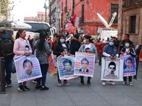 Relatives of the 43 students from the Normal Rural School of Ayotzinapa, victims of forced disappearance in 2014, attend a meeting with the...