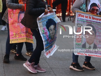 Relatives of the 43 students from the Normal Rural School of Ayotzinapa, victims of forced disappearance in 2014, attend a meeting with the...