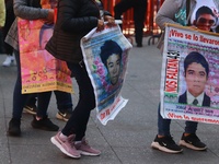 Relatives of the 43 students from the Normal Rural School of Ayotzinapa, victims of forced disappearance in 2014, attend a meeting with the...