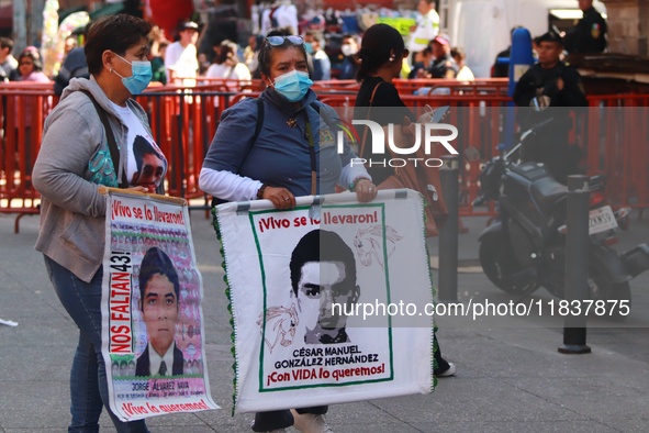 Relatives of the 43 students from the Normal Rural School of Ayotzinapa, victims of forced disappearance in 2014, attend a meeting with the...