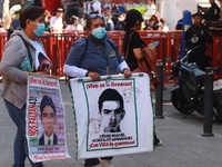 Relatives of the 43 students from the Normal Rural School of Ayotzinapa, victims of forced disappearance in 2014, attend a meeting with the...