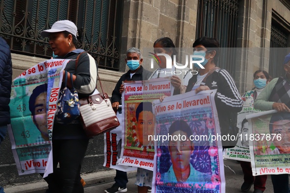 Relatives of the 43 students from the Normal Rural School of Ayotzinapa, victims of forced disappearance in 2014, attend a meeting with the...