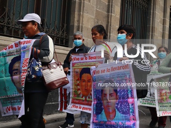 Relatives of the 43 students from the Normal Rural School of Ayotzinapa, victims of forced disappearance in 2014, attend a meeting with the...