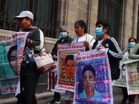 Relatives of the 43 students from the Normal Rural School of Ayotzinapa, victims of forced disappearance in 2014, attend a meeting with the...