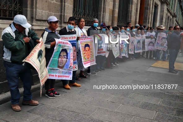 Relatives of the 43 students from the Normal Rural School of Ayotzinapa, victims of forced disappearance in 2014, attend a meeting with the...