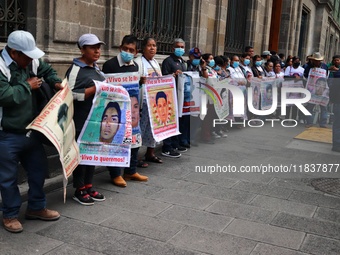 Relatives of the 43 students from the Normal Rural School of Ayotzinapa, victims of forced disappearance in 2014, attend a meeting with the...