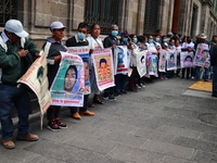 Relatives of the 43 students from the Normal Rural School of Ayotzinapa, victims of forced disappearance in 2014, attend a meeting with the...