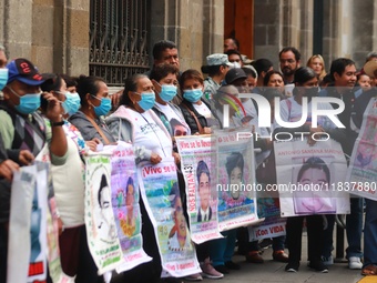 Relatives of the 43 students from the Normal Rural School of Ayotzinapa, victims of forced disappearance in 2014, attend a meeting with the...