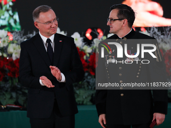 In Wieliczka, Poland, on December 2, 2024, the President of Poland, Andrzej Duda, presents decorations during the celebration of Saint Barba...