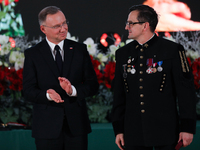 In Wieliczka, Poland, on December 2, 2024, the President of Poland, Andrzej Duda, presents decorations during the celebration of Saint Barba...