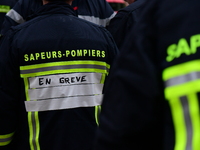 Several hundred firefighters demonstrate during the Lyon Festival of Lights in Lyon, France, on December 5, 2024. They demand the creation o...