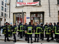 Several hundred firefighters demonstrate during the Lyon Festival of Lights in Lyon, France, on December 5, 2024. They demand the creation o...