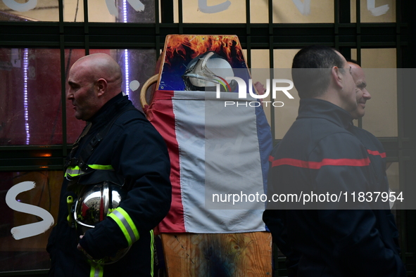 Several hundred firefighters demonstrate during the Lyon Festival of Lights in Lyon, France, on December 5, 2024. They demand the creation o...