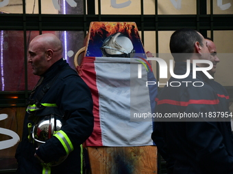 Several hundred firefighters demonstrate during the Lyon Festival of Lights in Lyon, France, on December 5, 2024. They demand the creation o...