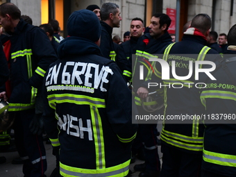 Several hundred firefighters demonstrate during the Lyon Festival of Lights in Lyon, France, on December 5, 2024. They demand the creation o...