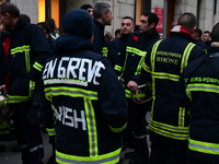 Several hundred firefighters demonstrate during the Lyon Festival of Lights in Lyon, France, on December 5, 2024. They demand the creation o...