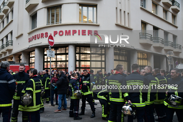 Several hundred firefighters demonstrate during the Lyon Festival of Lights in Lyon, France, on December 5, 2024. They demand the creation o...