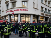 Several hundred firefighters demonstrate during the Lyon Festival of Lights in Lyon, France, on December 5, 2024. They demand the creation o...