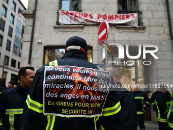 Several hundred firefighters demonstrate during the Lyon Festival of Lights in Lyon, France, on December 5, 2024. They demand the creation o...