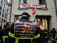 Several hundred firefighters demonstrate during the Lyon Festival of Lights in Lyon, France, on December 5, 2024. They demand the creation o...