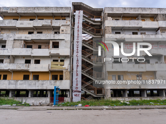 ''This is where it all starts. Ciao bella ciao,'' signs Comitato Vele di Scampia, on december 05, 2024.This is the long banner that stands t...