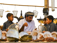 A man makes an oyster basket during the 14th Katara Traditional Dhow Festival in Katara Cultural Village in Doha, Qatar, on December 5, 2024...