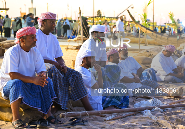 Traditional Arabic fishermen rest after a performance at the 14th Katara Traditional Dhow Festival at Katara Cultural Village in Doha, Qatar...